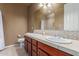 Bathroom with dual sinks, a tiled countertop, and decorative lighting at 9715 N Azure Ct # 4, Fountain Hills, AZ 85268