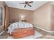 Bedroom displaying a rustic wood chest and unique headboard design at 9715 N Azure Ct # 4, Fountain Hills, AZ 85268