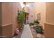 Private courtyard with desert landscaping and walkway leading to entry at 9715 N Azure Ct # 4, Fountain Hills, AZ 85268