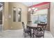 Well-lit dining room features neutral tones, stylish window shade, and built-in alcoves at 9715 N Azure Ct # 4, Fountain Hills, AZ 85268