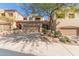 Attractive home featuring a two-car garage and desert landscaping in front at 9715 N Azure Ct # 4, Fountain Hills, AZ 85268