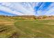 Lush, green golf course winding through desert landscape provides a beautiful view, enhancing the community at 9715 N Azure Ct # 4, Fountain Hills, AZ 85268