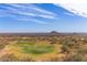 An elevated view features the golf course with mountains in the distance at 9715 N Azure Ct # 4, Fountain Hills, AZ 85268