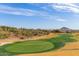 Stunning desert landscape view of a lush green golf course, providing a scenic backdrop for community homes at 9715 N Azure Ct # 4, Fountain Hills, AZ 85268