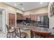 Well-equipped kitchen with granite countertops, stainless steel appliances, and breakfast bar at 9715 N Azure Ct # 4, Fountain Hills, AZ 85268