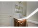 Bathroom with vanity, toilet and framed mirror at 1016 E Saddleback Pl, San Tan Valley, AZ 85143