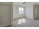 Bedroom with carpet, window and interior door at 1016 E Saddleback Pl, San Tan Valley, AZ 85143