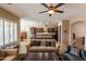 Inviting living room featuring an open layout with the gourmet kitchen at 10657 E Evergreen St, Mesa, AZ 85207