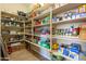 Walk-in pantry with abundant shelving, perfect for organized storage at 10657 E Evergreen St, Mesa, AZ 85207