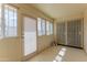 Bright sun room featuring multiple windows and doors providing sunlight at 10701 W Mountain View Rd, Sun City, AZ 85351