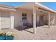 Inviting back patio area, ideal for entertaining, featuring seating, and outdoor living space at 11413 E Neville Ave, Mesa, AZ 85209