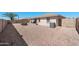 Spacious backyard with desert landscaping, a covered patio, and privacy fencing at 11413 E Neville Ave, Mesa, AZ 85209