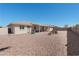 Expansive backyard featuring low-maintenance desert landscaping and a serene patio space at 11413 E Neville Ave, Mesa, AZ 85209