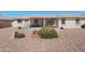 Relaxing backyard with patio seating, desert landscaping, and room for outdoor enjoyment at 11413 E Neville Ave, Mesa, AZ 85209