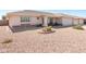 Inviting home featuring desert landscaping and a well-maintained exterior; the perfect curb appeal at 11413 E Neville Ave, Mesa, AZ 85209