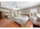 Serene main bedroom offers plenty of natural light, ample closet space and neutral colors at 11413 E Neville Ave, Mesa, AZ 85209