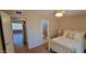 Comfortable bedroom featuring an ensuite bathroom with a walk-in shower at 11830 S Paiute St, Phoenix, AZ 85044