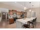 Spacious kitchen with a large island, stainless steel appliances, and a stylish backsplash at 11830 S Paiute St, Phoenix, AZ 85044