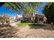 Expansive backyard featuring a pool, patio, and generous lawn area, ideal for recreation and outdoor living at 1202 E Desert Broom Way, Phoenix, AZ 85048