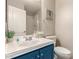 Well-lit bathroom featuring a modern sink with vanity and updated fixtures at 1202 E Desert Broom Way, Phoenix, AZ 85048