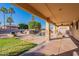 Covered patio leading to a backyard pool, grill and entertaining area at 12925 W Llano Dr, Litchfield Park, AZ 85340