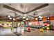 Bright gym space featuring exercise bikes, balance balls, and fans at 12956 W Eagle Ridge Ln, Peoria, AZ 85383