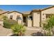 Charming front yard with desert landscaping, gated entry, and inviting walkway at 13054 W Big Oak St, Peoria, AZ 85383