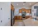 Modern kitchen with stainless steel appliances and stone countertops at 13054 W Big Oak St, Peoria, AZ 85383