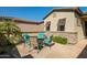 Secluded outdoor patio featuring a stone surface and comfortable seating at 13054 W Big Oak St, Peoria, AZ 85383