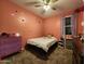 Cozy bedroom with a twin-sized bed, simple decor, and plenty of natural light from the window at 13487 W Buckskin Trl, Peoria, AZ 85383