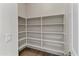 Organized pantry with ample shelving for optimal storage and convenience at 14309 W Weldon Ave, Goodyear, AZ 85395