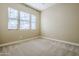 Bright bedroom featuring windows providing an abundance of natural light at 14762 W Georgia Dr, Surprise, AZ 85379