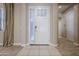 Bright entryway with tile flooring and a front door featuring sidelights and decorative glass at 14762 W Georgia Dr, Surprise, AZ 85379