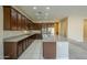 Modern kitchen featuring a large center island, stainless steel appliances, and granite countertops at 14762 W Georgia Dr, Surprise, AZ 85379