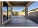 A covered patio featuring a sliding glass door entry to the residence at 14762 W Georgia Dr, Surprise, AZ 85379