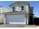 Charming two-story home featuring a spacious two-car garage and a well-maintained front yard at 1588 N Pueblo Dr, Apache Junction, AZ 85120