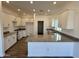 Modern kitchen featuring granite countertops, white cabinetry, and recessed lighting at 1588 N Pueblo Dr, Apache Junction, AZ 85120