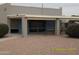 Community clubhouse with seating areas, including benches, and desert landscaping at 17016 N 66Th Ter, Glendale, AZ 85308