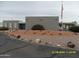 Image featuring the Casa Campana community with landscaping and American flag at 17016 N 66Th Ter, Glendale, AZ 85308