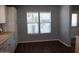 Well-lit dining area with two large windows bringing in natural light at 17016 N 66Th Ter, Glendale, AZ 85308