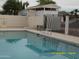 Community pool with safety features, perfect for relaxation and recreation on a sunny day at 17016 N 66Th Ter, Glendale, AZ 85308