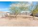 Backyard featuring a block fence and desert landscaping at 1793 S Valley Dr, Apache Junction, AZ 85120