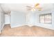 Inviting living room with tile floors, a ceiling fan, and ample natural light at 1793 S Valley Dr, Apache Junction, AZ 85120