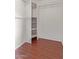 Walk-in closet featuring shelving and a hanging rod for organized storage at 18608 N 4Th Ave, Phoenix, AZ 85027