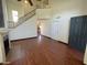 Bright and airy living room with a staircase, wood floors, and a large window at 18608 N 4Th Ave, Phoenix, AZ 85027