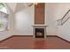 Living room features wood floors, a fireplace, vaulted ceiling, and lots of natural light at 18608 N 4Th Ave, Phoenix, AZ 85027