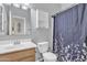 Standard bathroom with white fixtures and a shower-tub combination at 2013 E Dust Devil Dr, San Tan Valley, AZ 85143