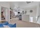 Bright, airy bonus room with custom storage shelves and neutral carpeting at 2013 E Dust Devil Dr, San Tan Valley, AZ 85143