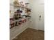 Pantry with wire shelving and tile flooring, providing ample storage space at 2013 E Dust Devil Dr, San Tan Valley, AZ 85143