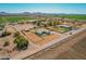 Expansive property featuring a beautiful single story home, large fenced yard and sparkling pool at 21717 W South Mountain Ave, Buckeye, AZ 85326